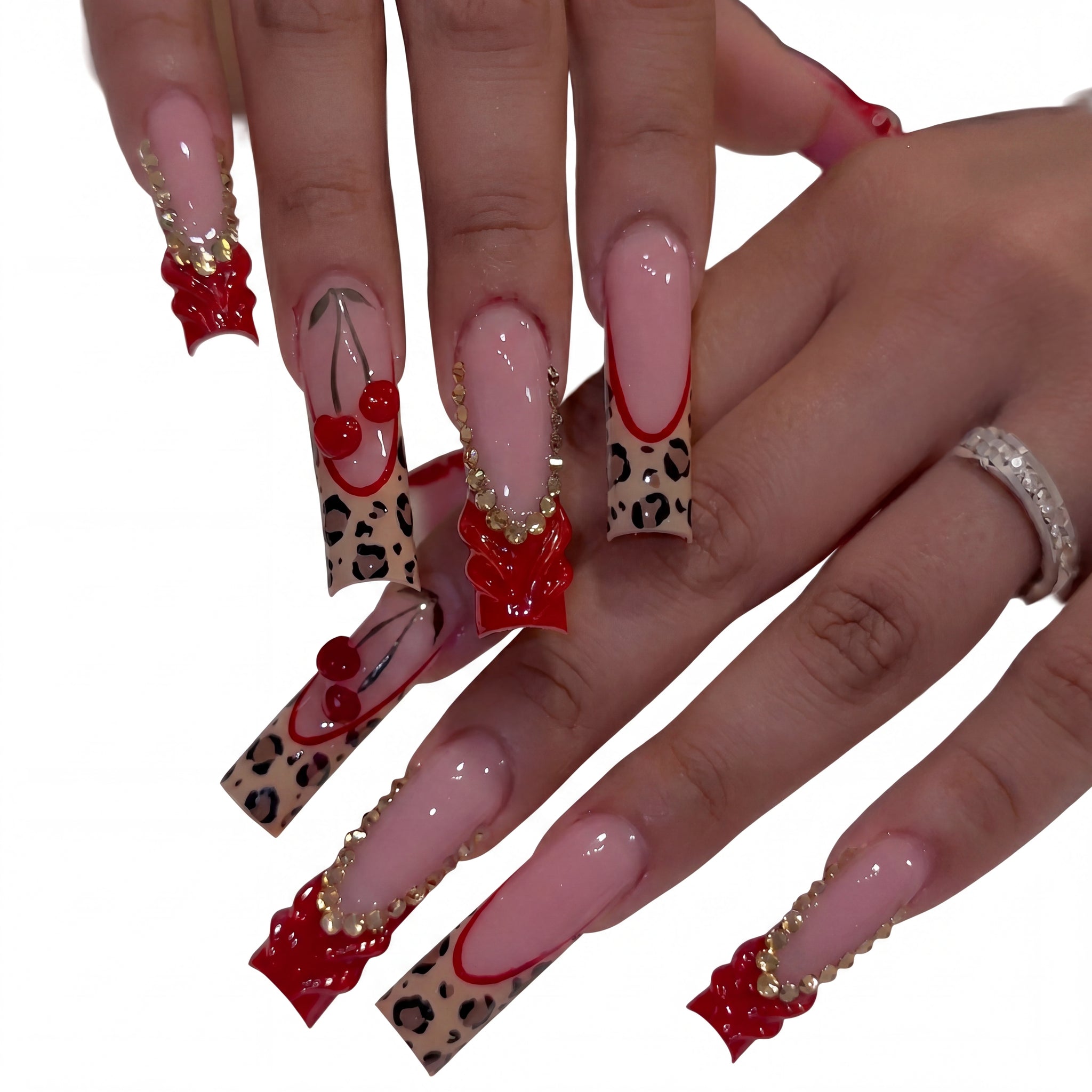 Cherry Bow Leopard press-on nails on hand