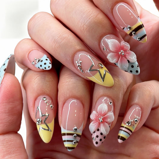 Bumblebee Bloom press-on nails on hand