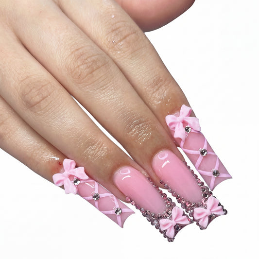 Ballet Bow press-on nails on hand
