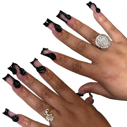 Pink Flame press-on nails on hand