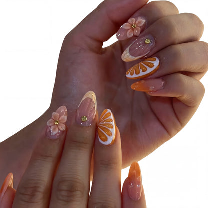 Citrus Bloom press-on nails on hand