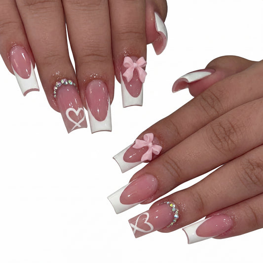 Sweetheart French press-on nails on hand