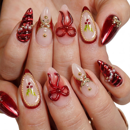 Ruby Ribbon press-on nails on hand